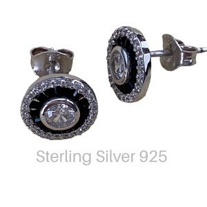 Elegant Sterling Silver 925: circular earrings with black stone accent.